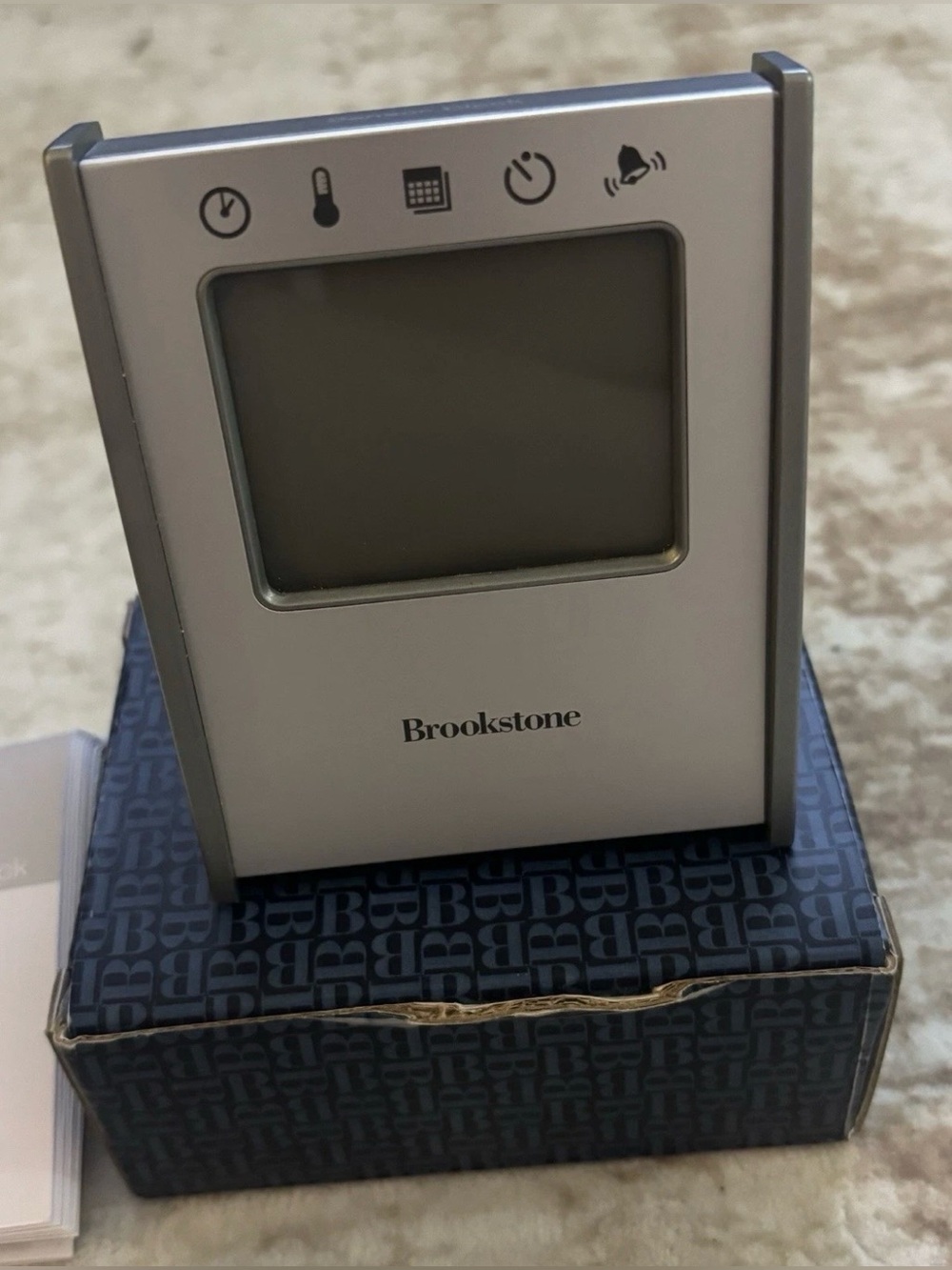 Brookstone 5-in-1 Sensor Travel Clock Time Temp Date Alarm Timer